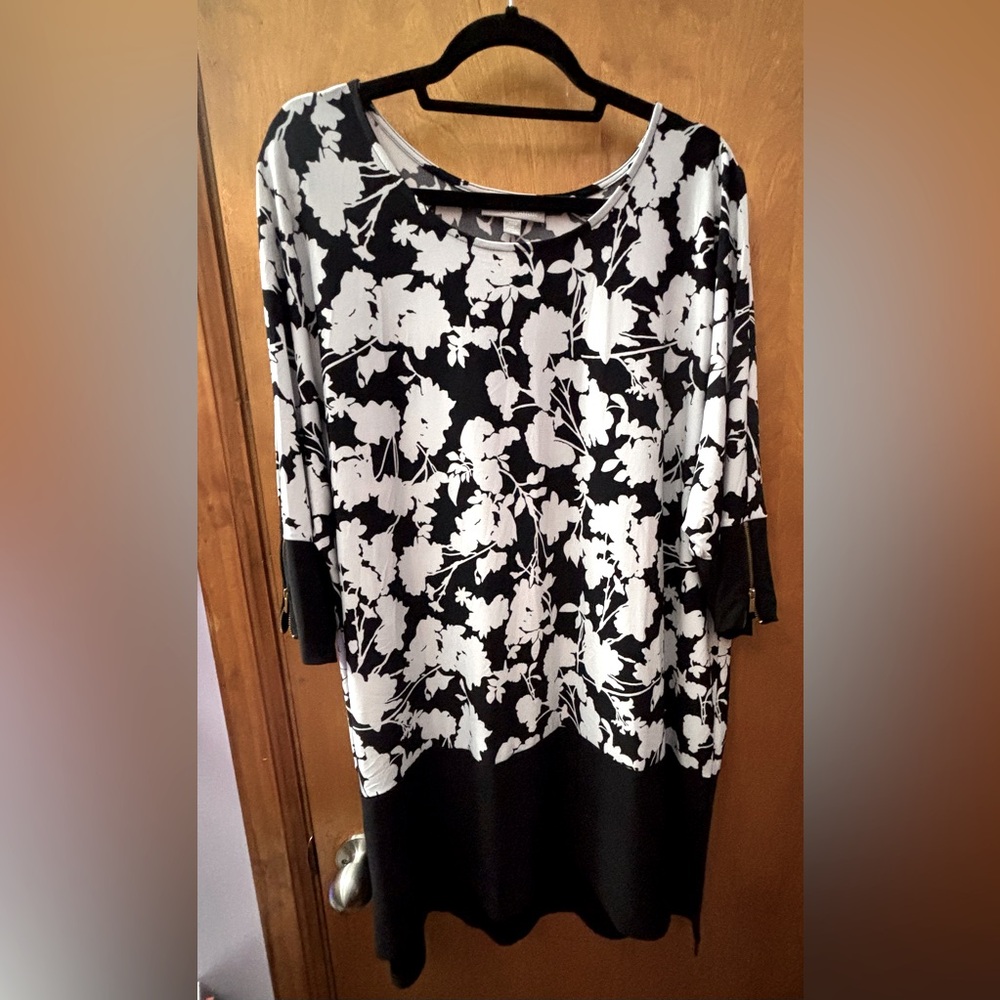 Woman Within Black and White Floral Tunic